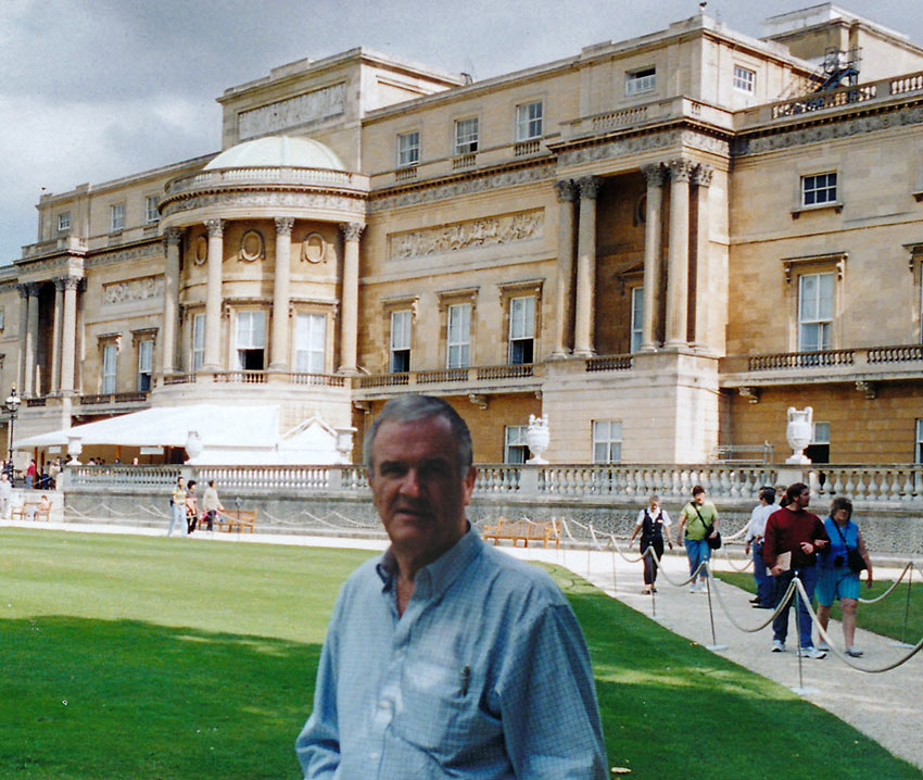 the writer at the back garden of Buckingham Palace