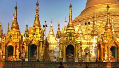 Burmese praying at pagoda
