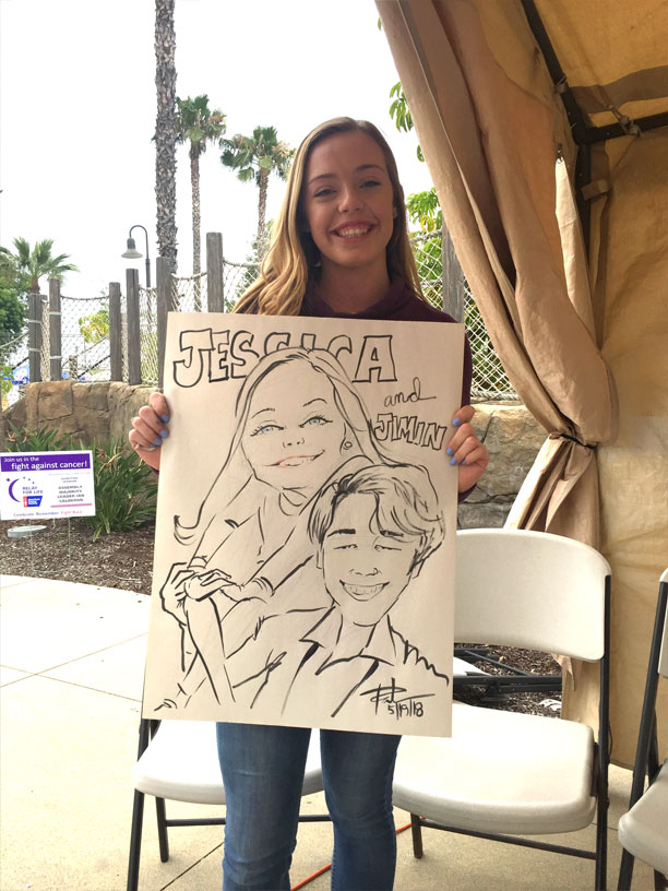 high schooler with caricature of her and Korean Boy Band BTS singer