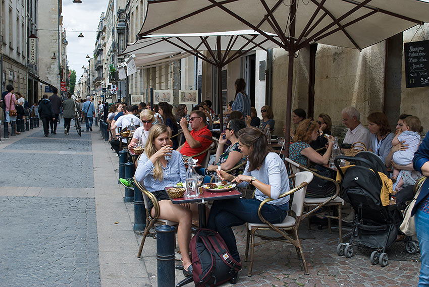 sidewalk tables and restaurants at Bordeaux historic Old Town