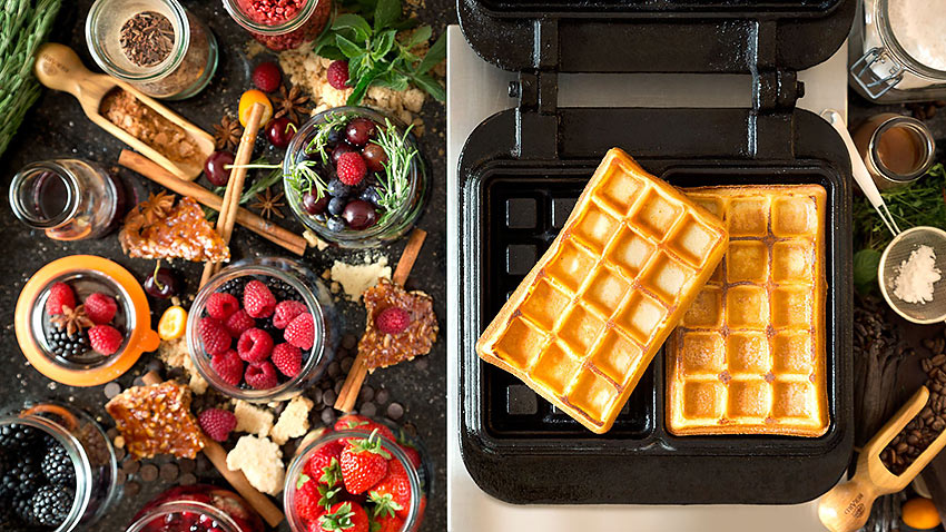 a breakfast tray with waffles at the Atlantic Kempinski Hotel, Hamburg