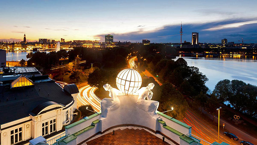 overhead view of Hamburg's Atlantic Kempinski Hotel at night