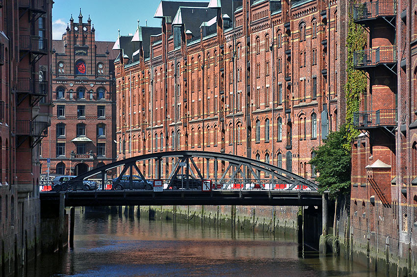 canal bridge and picturesque, restored warehouses at the Speicherstadt district, Hamburg