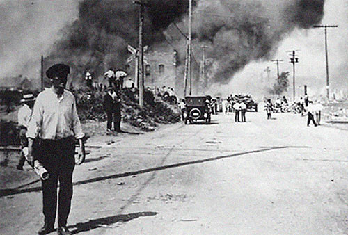 burning neighborhood in Greenwood, Tulsa race riot 1921