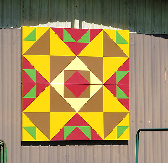 colorful block at a barn on the Rohrer property honors six tribes of Native Americans