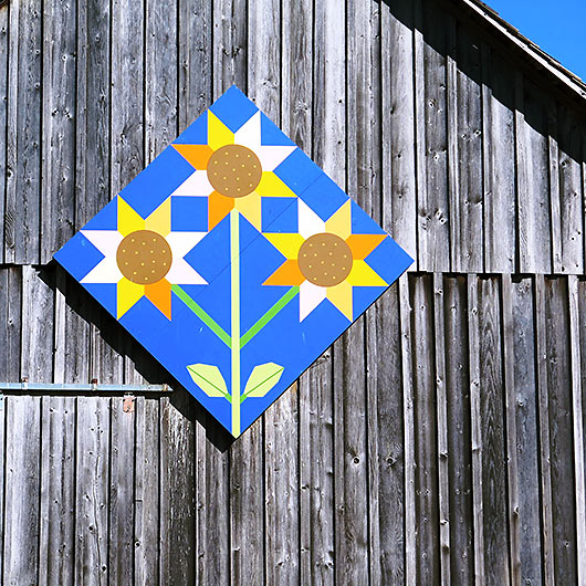 sunflower wooden block on a barn door, Tualatin Valley, Oregon