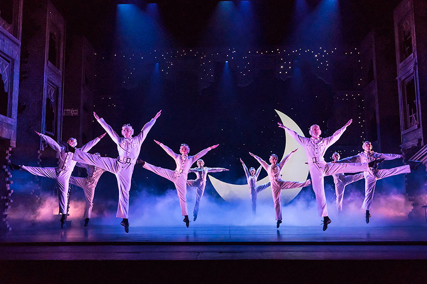 Cinderella dance company in one of the production numbers choreographed by Sir Matthew Bourne