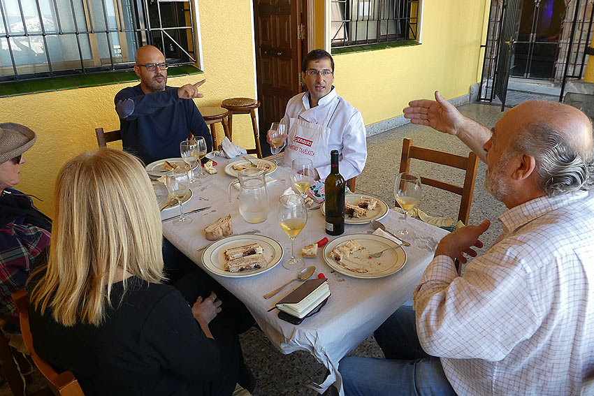 Basque men engaged in lively conversation