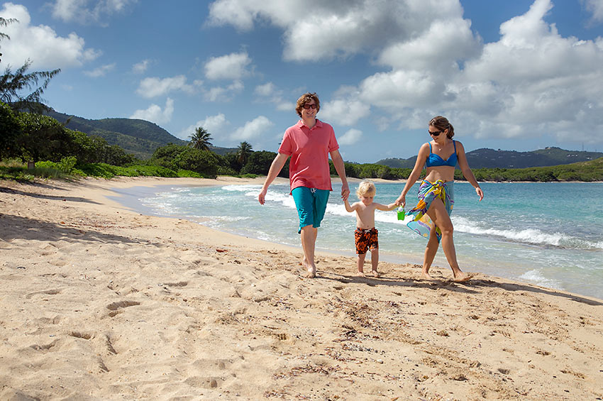 young family at the Mermaid Beach, St. Croix