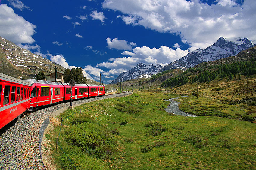 Glacier Express train in Swiss Alps landscape