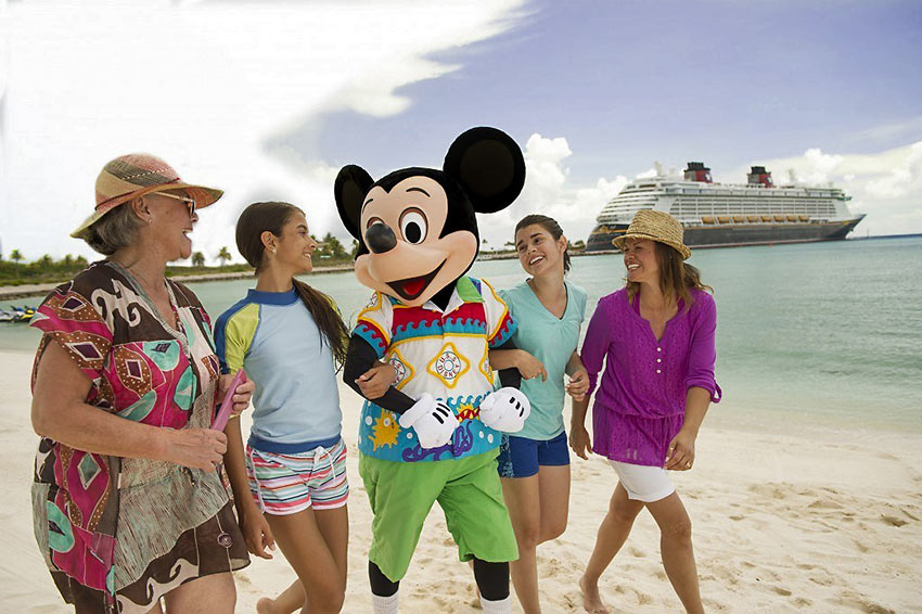 Mickey Mouse with guests on a Disney Cruise Line voyage