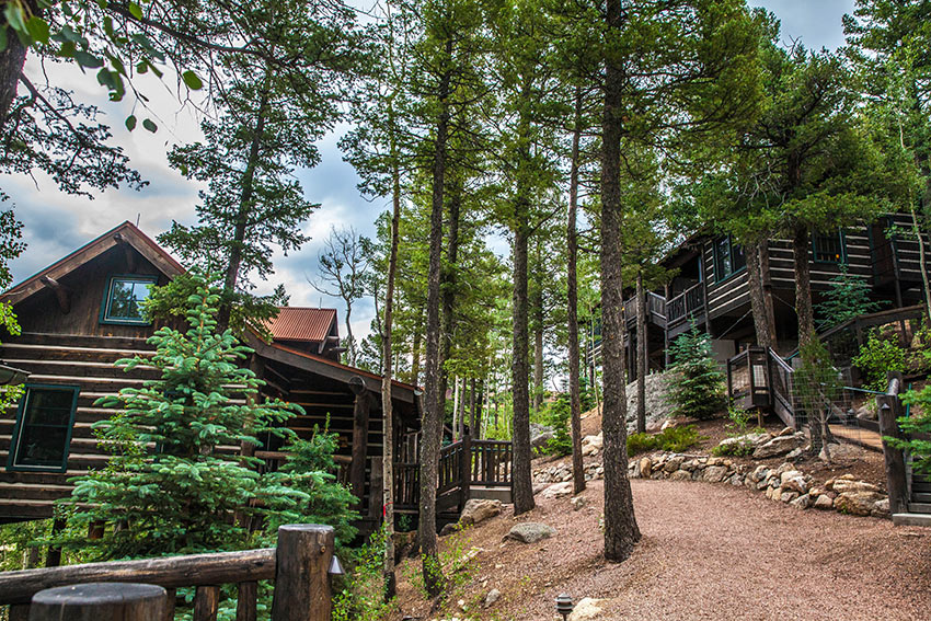 one and two-bedroom rustic log guest cabins near the Lodge