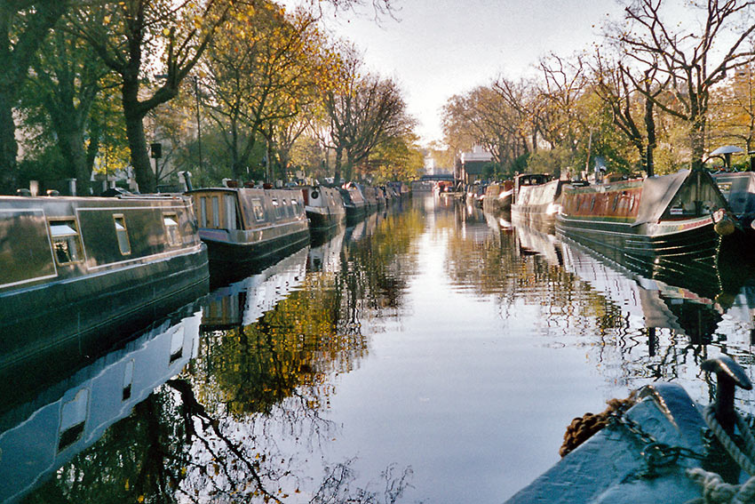 barges turned into homes and parked on either side of the Regent's Canal, London