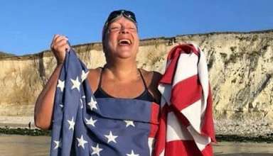 Diana Qualls Corbin with U.S. flag