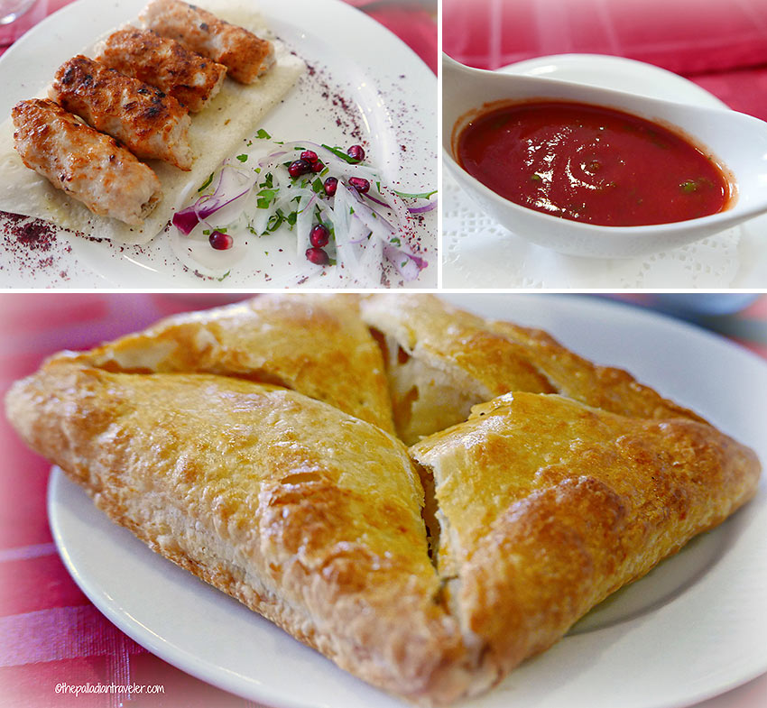 chicken kebabs, stuffed with herbs and spices, khachapuri, and spicy tomato-based dipping sauce at Shashlik-Mashlyk