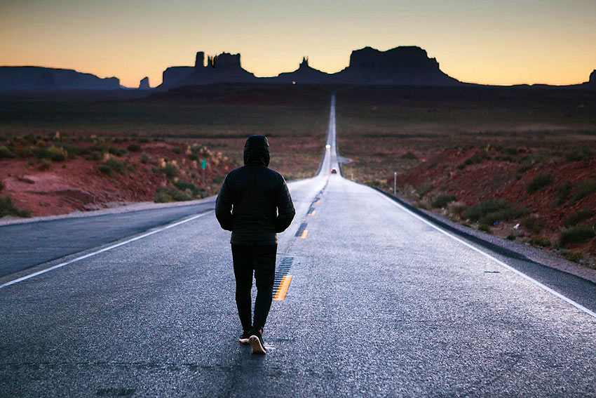 walking on the road to Monument Valley