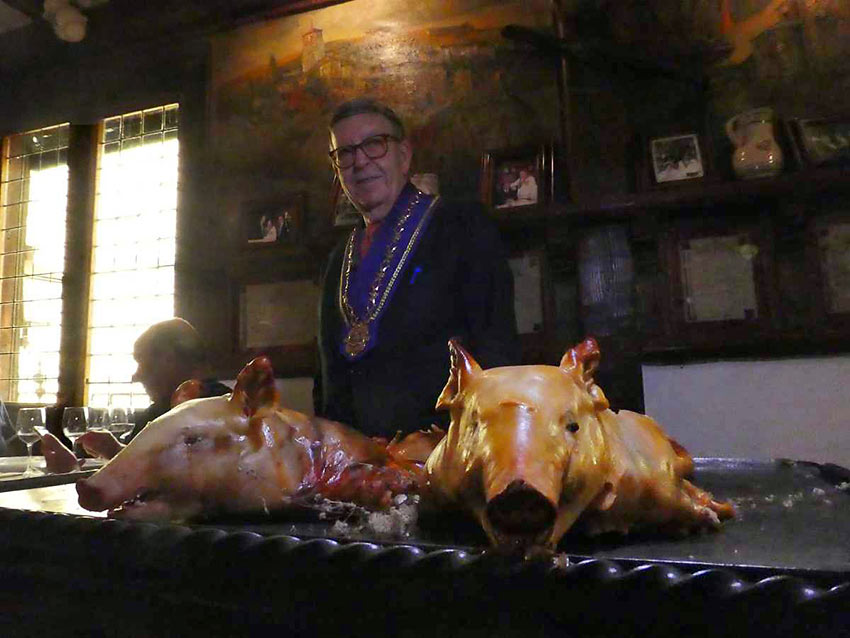 suckling pigs with Candido just before carving