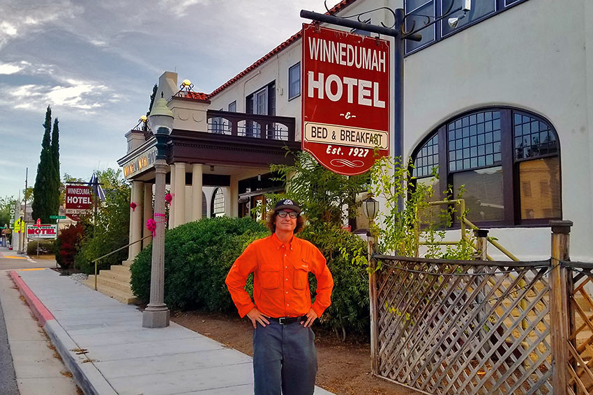 the writer in front of the Winnedumah Hotel, Independence, CA