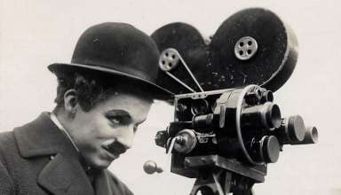 Charlie Chaplin with movie camera