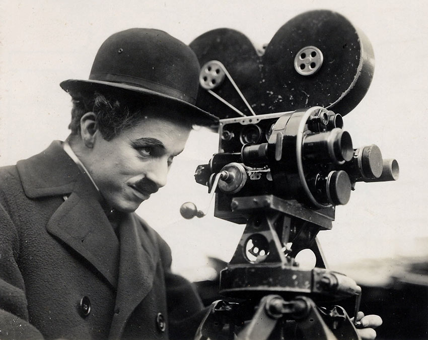 Charlie Chaplin with movie camera