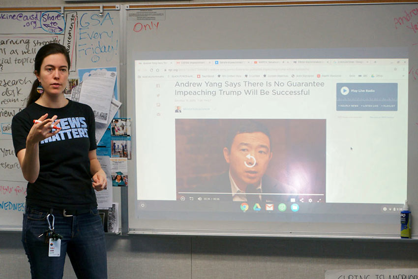 Chloe Erskine, who teaches world history at Oakland's Dewey Academy, instructing students