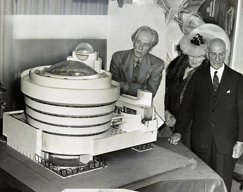 Frank Lloyd Wright with a model of the Guggenheim Museum, 1945