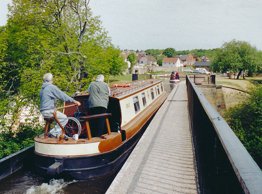 narrowboat on canal bridge