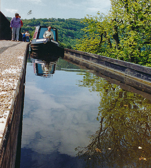 narrowboat on canal bridge