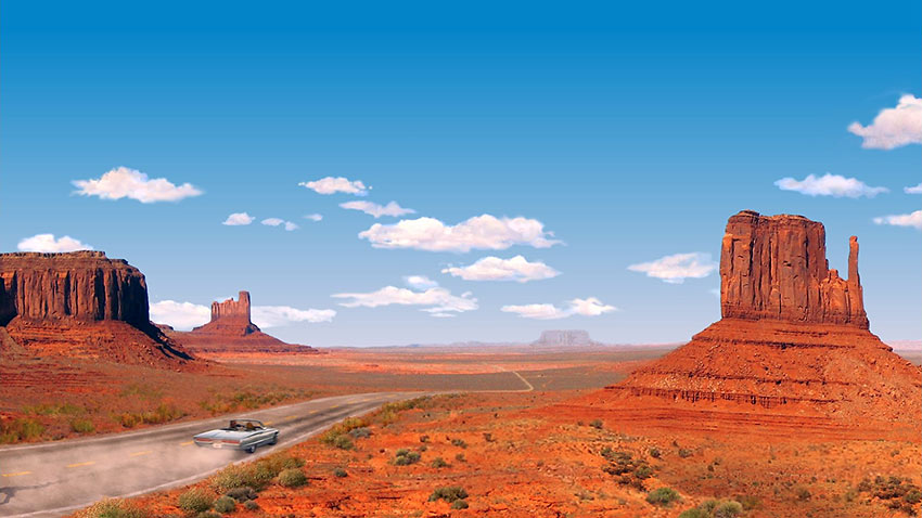 Road Trippers navigate their car through majestic John Ford Country