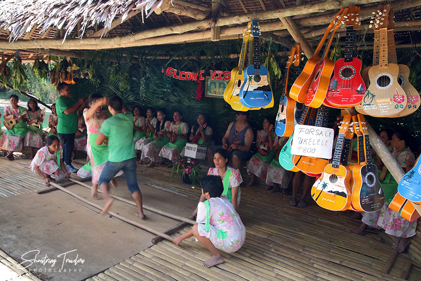 local dancers and musicians performing for visitors on a raft at the Loboc River