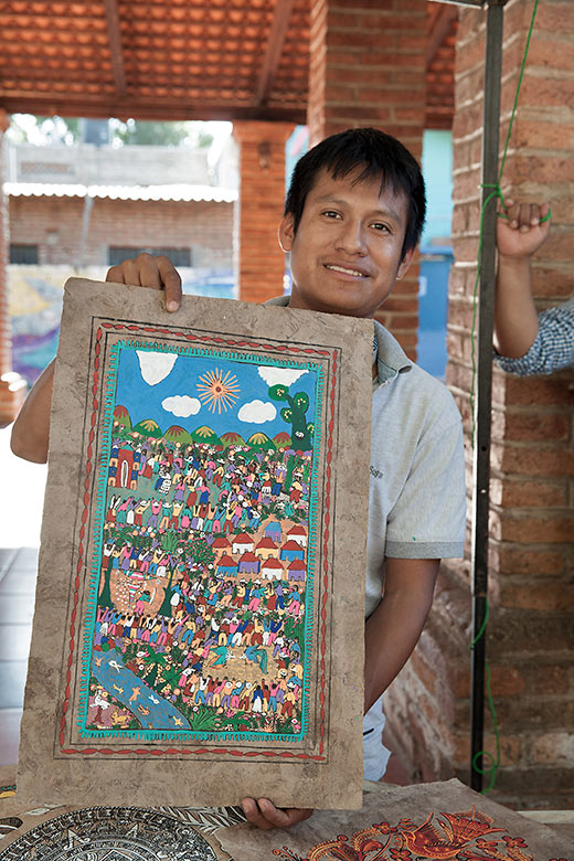 local painter Marco and one of his paintings in San Pancho