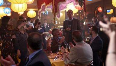 Jim (David Thewlis) joins in on a celebration in a Brazilian restaurant