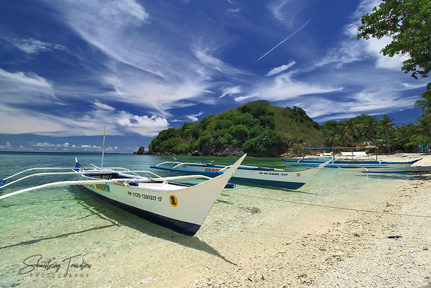 outrigger boats at Alad Island