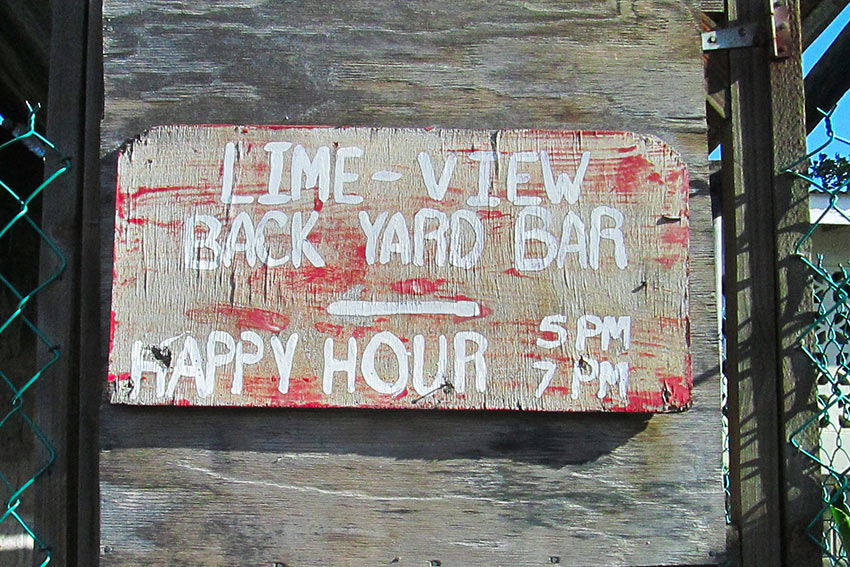 rum shop sign on a beach, Nevis Island