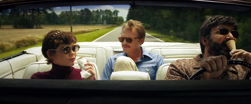 Beth (Sophia Lillis,) Uncle Frank (Paul Bettany) and Wally (Peter Macdiss) in a road trip scene