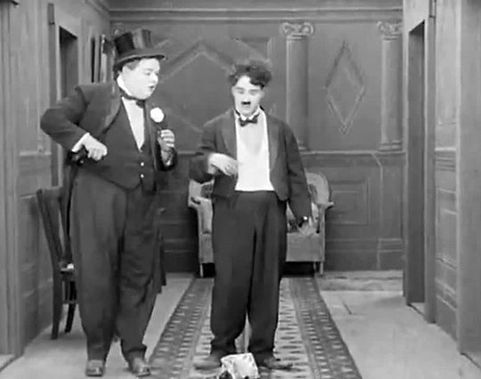 Chaplin and Roscoe “Fatty” Arbuckle