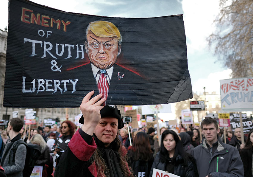 protester in Whitehall during the anti-Trump march in London