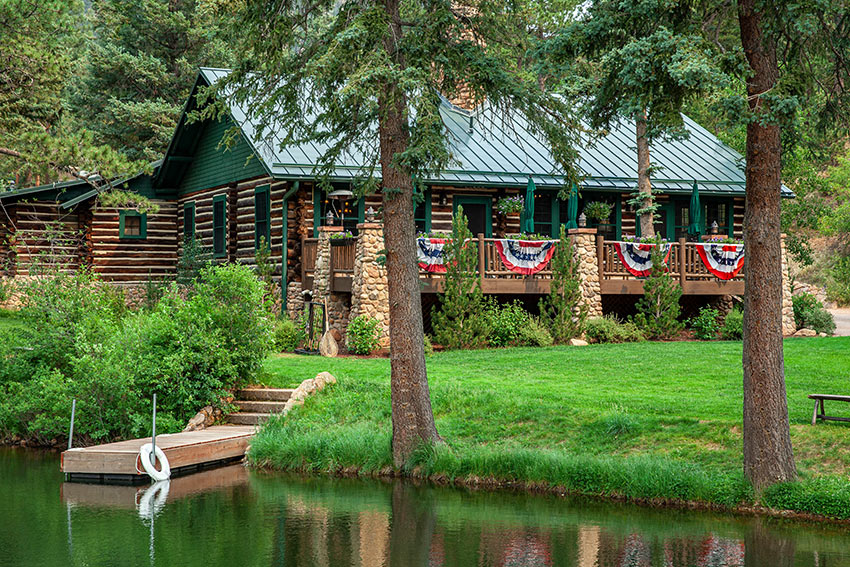 decorative flags at the log cabin at Emerald Valley Ranch