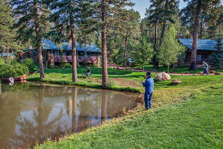 anglers at a small lake