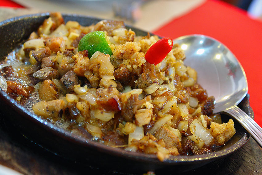 sisig on a sizzling plate