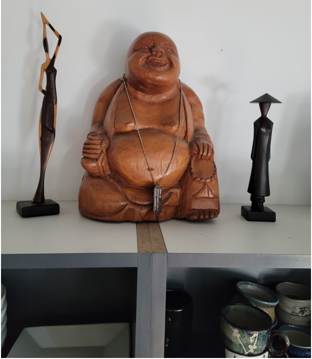 This image has an empty alt attribute; its file name is buddah.jpg